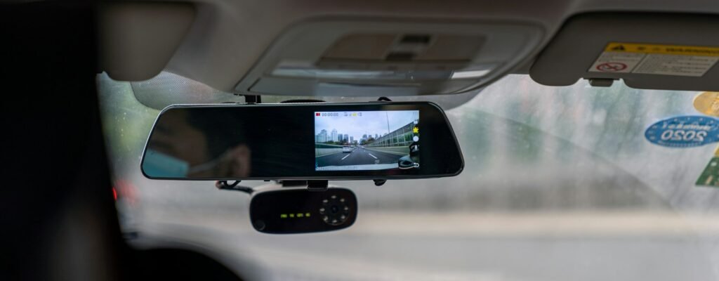 car side mirror with water droplets